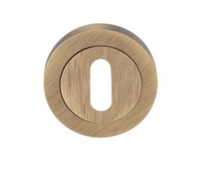 Carlisle Brass Antique Brass Standard Keyhole Escutcheon | EUL002AB