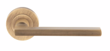 Set Antique Brass Trentino Lever Furniture on round rose | EUL030AB