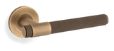 Alexander & Wilks Antique Brass Kingston Knurled Lever on rose | AW240AB