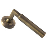Set Antique Brass Amiata Lever Furniture on round rose | EUL040AB