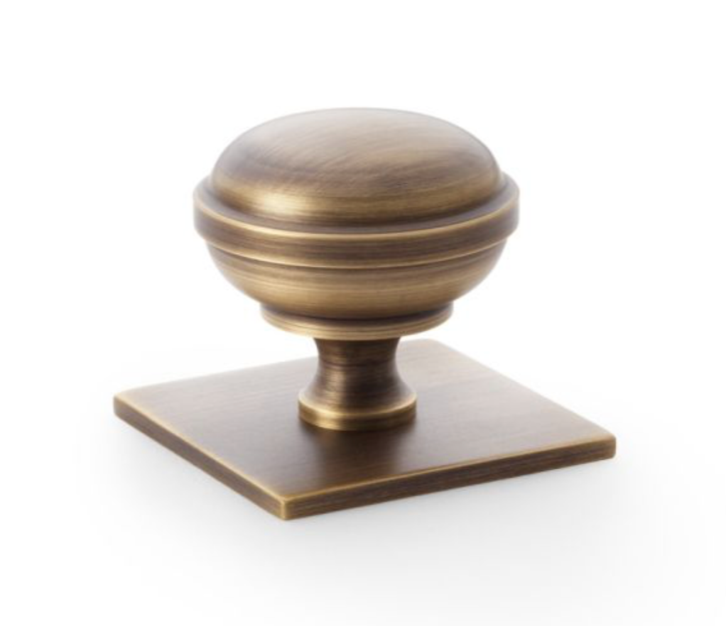 Alexander and Wilks 38mm Quantock Antique Brass Cupboard Knob on Square Backplate