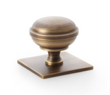 Alexander and Wilks 38mm Quantock Antique Brass Cupboard Knob on Square Backplate